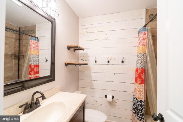 770 Willow Grove Rd, Felton, DE 19943 - full bathroom with vanity, toilet, wood walls, and a shower with curtain