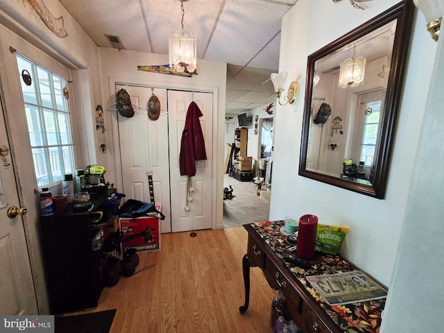 15 Weaver Ln, Brandywine, WV 26802 - entryway featuring wood finished floors, plenty of natural light, a drop ceiling, and a chandelier