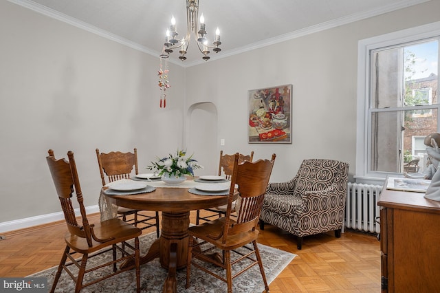 2332 E Baltimore St E, Baltimore, MD 21224 - dining area with radiator heating unit, a chandelier, crown molding, arched walkways, and baseboards