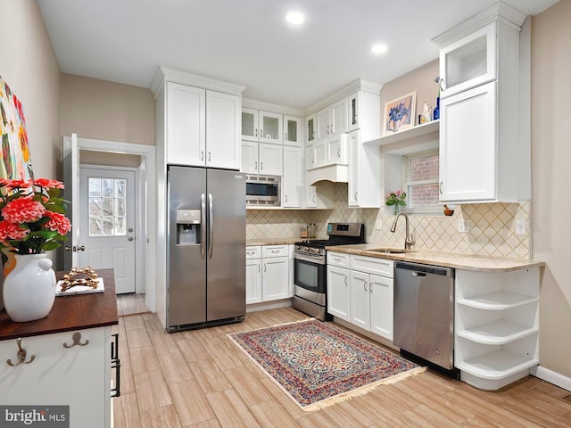 2332 E Baltimore St E, Baltimore, MD 21224 - kitchen featuring appliances with stainless steel finishes, open shelves, white cabinetry, and recessed lighting