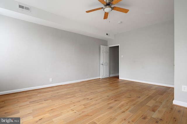 2332 E Baltimore St E, Baltimore, MD 21224 - spare room featuring light wood-style flooring, baseboards, and a ceiling fan