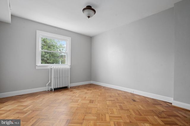 2332 E Baltimore St E, Baltimore, MD 21224 - spare room with radiator and baseboards