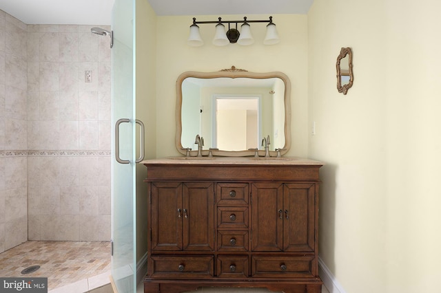 2332 E Baltimore St E, Baltimore, MD 21224 - bathroom featuring a stall shower, vanity, and baseboards