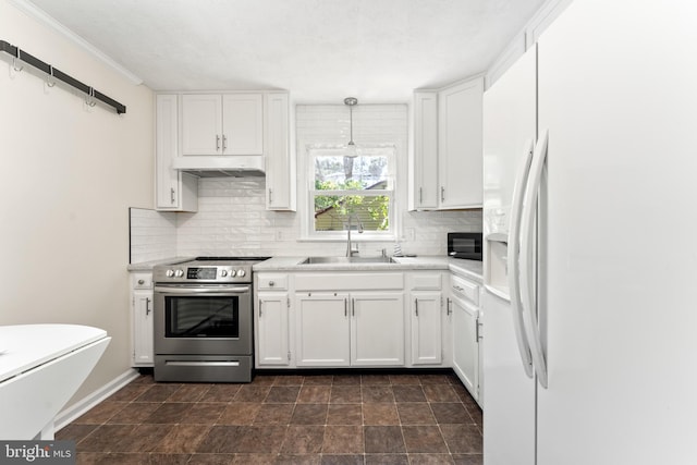 kitchen with white fridge with ice dispenser, electric stove, a sink, backsplash, and white cabinetry