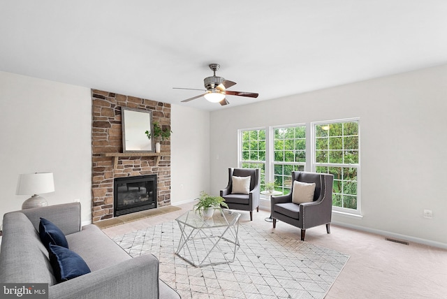 924 Towering Oak Ct, Purcellville, VA 20132 - living area featuring ceiling fan, a fireplace, light colored carpet, and baseboards
