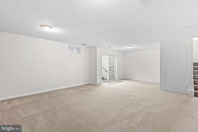 924 Towering Oak Ct, Purcellville, VA 20132 - below grade area featuring light colored carpet, baseboards, and stairs