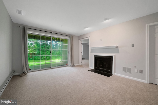 unfurnished living room with carpet floors, baseboards, and a fireplace with flush hearth