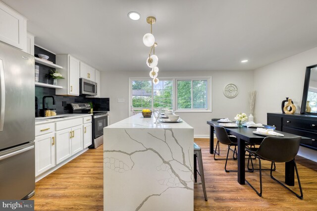 9815 Winands Rd, Randallstown, MD 21133 - kitchen featuring stainless steel appliances, a sink, open shelves, white cabinetry, and recessed lighting
