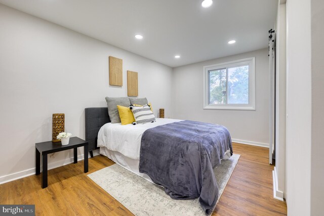 9815 Winands Rd, Randallstown, MD 21133 - bedroom featuring wood finished floors, recessed lighting, and baseboards