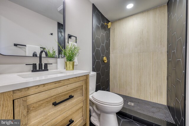 9815 Winands Rd, Randallstown, MD 21133 - bathroom with toilet, tile patterned floors, vanity, recessed lighting, and a shower