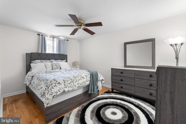 8031 Stratman Rd, Baltimore, MD 21222 - bedroom featuring wood finished floors, baseboards, and ceiling fan