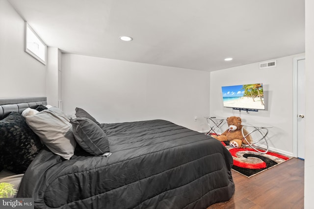 8031 Stratman Rd, Baltimore, MD 21222 - bedroom with wood finished floors and recessed lighting