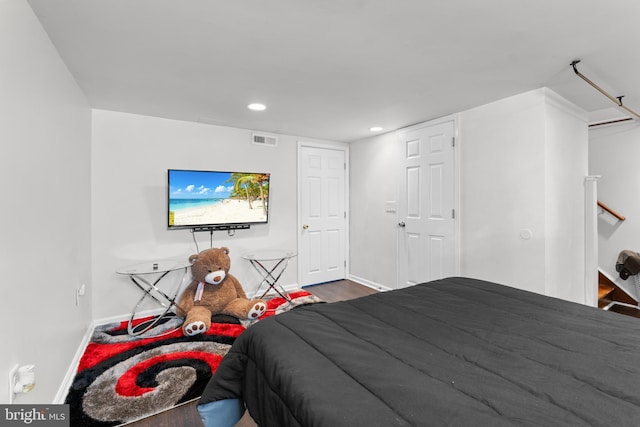 8031 Stratman Rd, Baltimore, MD 21222 - bedroom with wood finished floors, baseboards, and recessed lighting