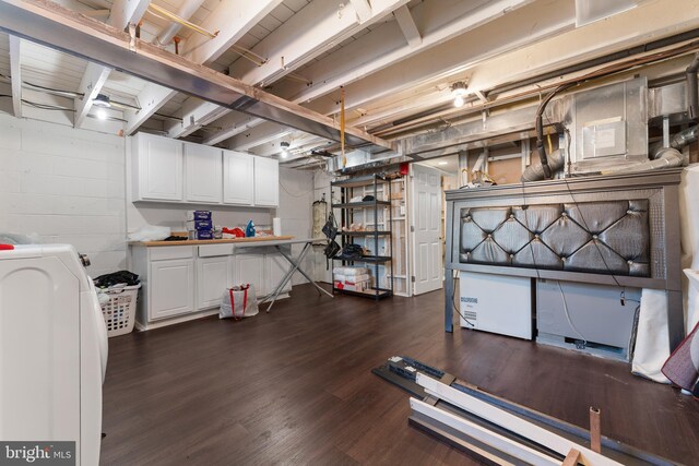 8031 Stratman Rd, Baltimore, MD 21222 - unfinished basement featuring washer / clothes dryer and dark wood finished floors