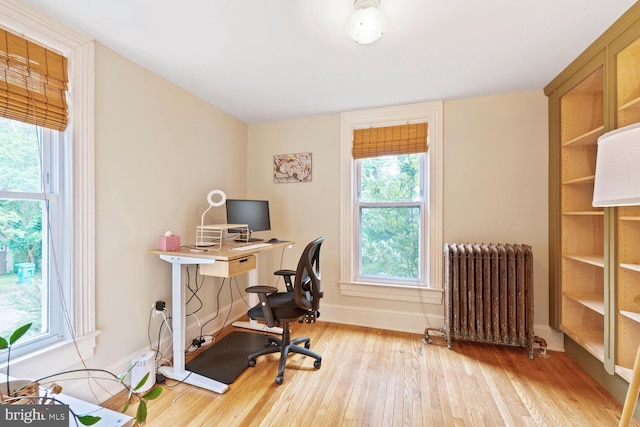 4901 40th Pl, Hyattsville, MD 20781 - home office with radiator, hardwood / wood-style floors, and baseboards