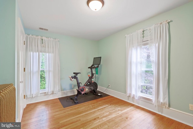 4901 40th Pl, Hyattsville, MD 20781 - workout area with hardwood / wood-style flooring, radiator, and baseboards