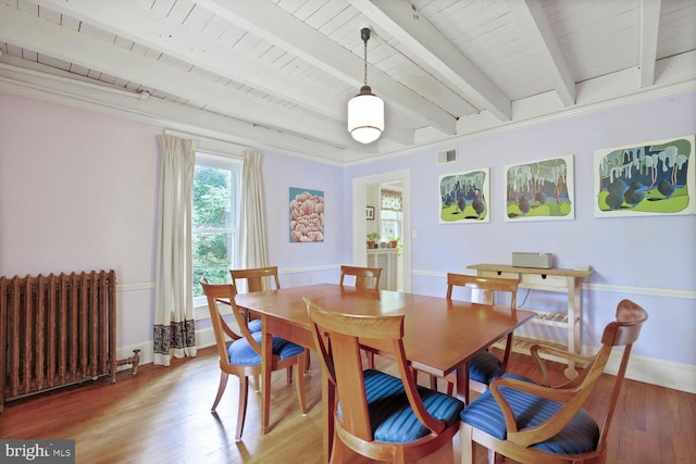 4901 40th Pl, Hyattsville, MD 20781 - dining room featuring radiator heating unit, wooden ceiling, light wood-style floors, beamed ceiling, and baseboards