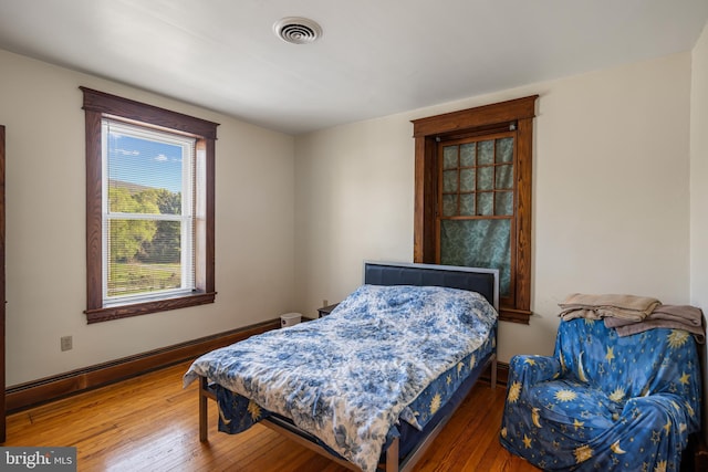 16 N Maple Ave, Smithsburg, MD 21783 - bedroom with hardwood / wood-style flooring and a baseboard heating unit