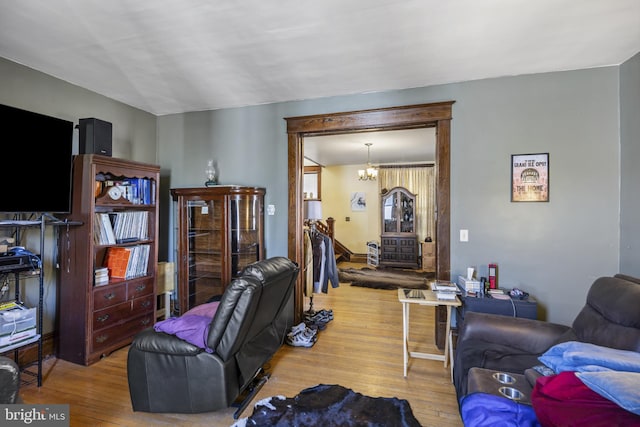 16 N Maple Ave, Smithsburg, MD 21783 - living room featuring wood finished floors and a chandelier
