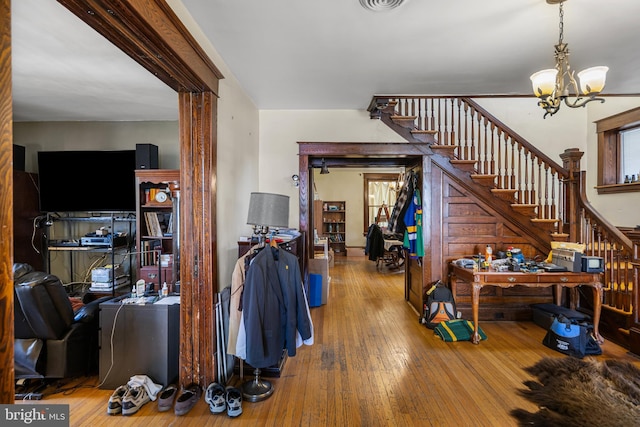 16 N Maple Ave, Smithsburg, MD 21783 - living area featuring stairway, a chandelier, and hardwood / wood-style flooring