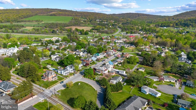16 N Maple Ave, Smithsburg, MD 21783 - aerial view of property and surrounding area with a mountainous background and nearby suburban area