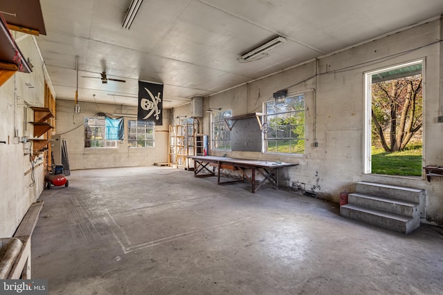 16 N Maple Ave, Smithsburg, MD 21783 - garage featuring a workshop area and concrete block wall