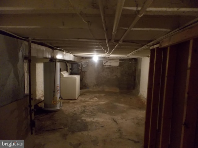 716 N Milton Ave, Baltimore, MD 21205 - unfinished below grade area with washer / dryer and gas water heater