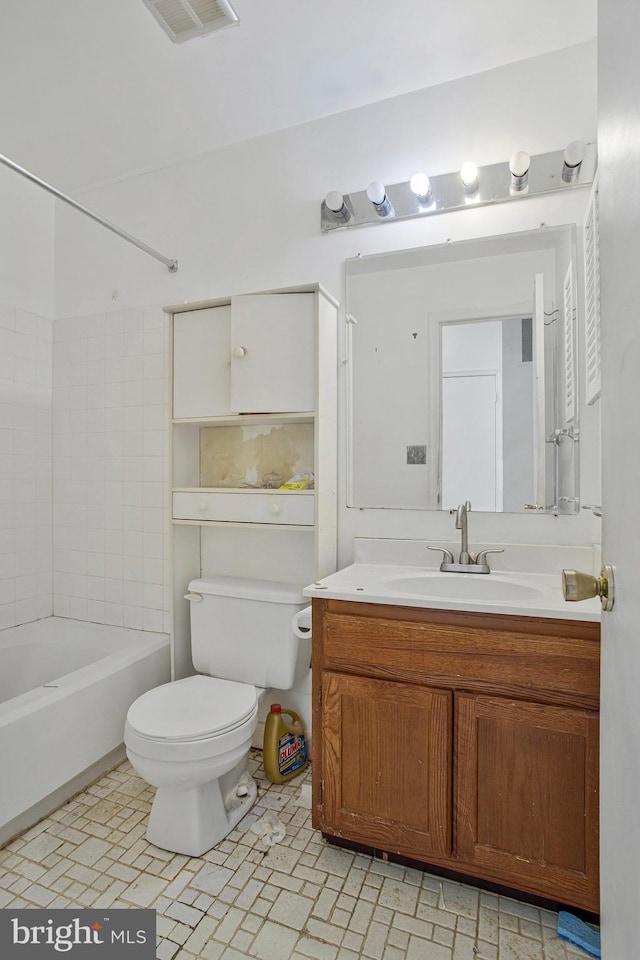 10734 Castleton Way, Upper Marlboro, MD 20774 - bathroom featuring toilet, vanity, and tub / shower combination
