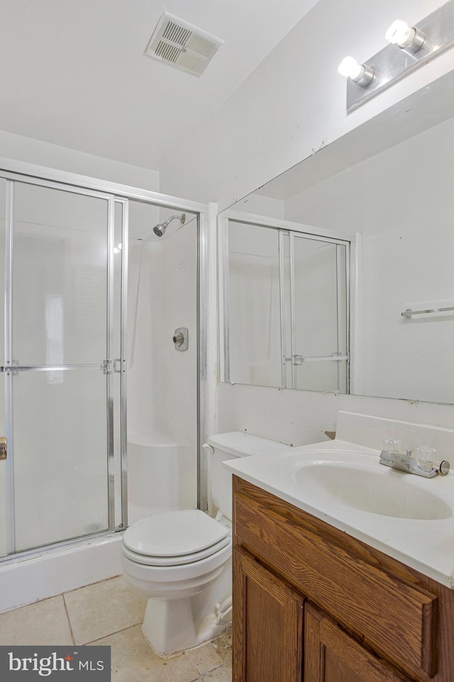 10734 Castleton Way, Upper Marlboro, MD 20774 - bathroom with a shower stall, toilet, vanity, and tile patterned flooring