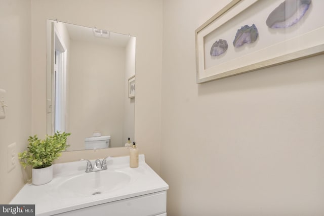 9807 Spillway Ct, Burke, VA 22015 - half bathroom with vanity and toilet