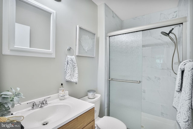 9807 Spillway Ct, Burke, VA 22015 - bathroom featuring a shower stall, vanity, and toilet