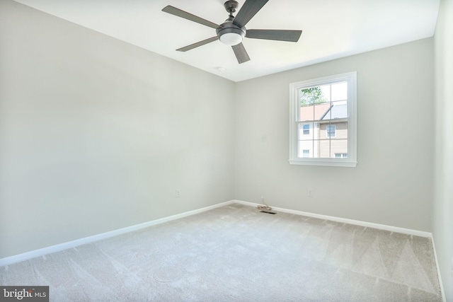 9807 Spillway Ct, Burke, VA 22015 - empty room with light carpet, baseboards, and a ceiling fan