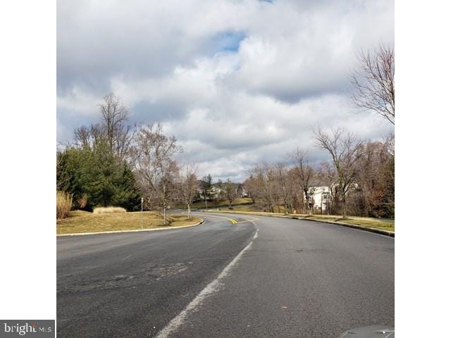 8790 Sage Brush Way Unit 19, Columbia, MD 21045 - view of asphalt road featuring curbs