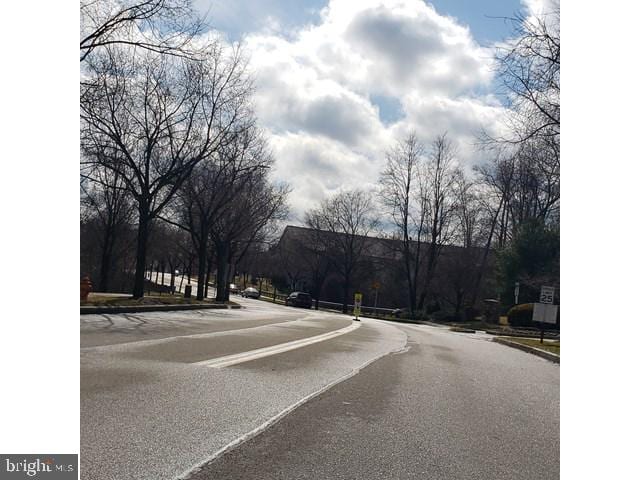 8790 Sage Brush Way Unit 19, Columbia, MD 21045 - view of asphalt street featuring curbs and sidewalks