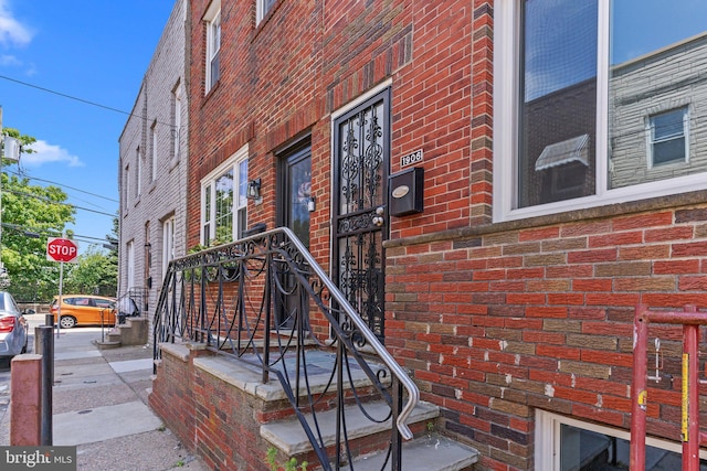 1906 Durfor St, Philadelphia, PA 19145 - doorway to property featuring brick siding
