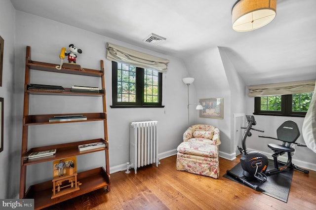 410 Arthurs Round Table, Wynnewood, PA 19096 - sitting room with radiator, lofted ceiling, wood finished floors, healthy amount of natural light, and baseboards