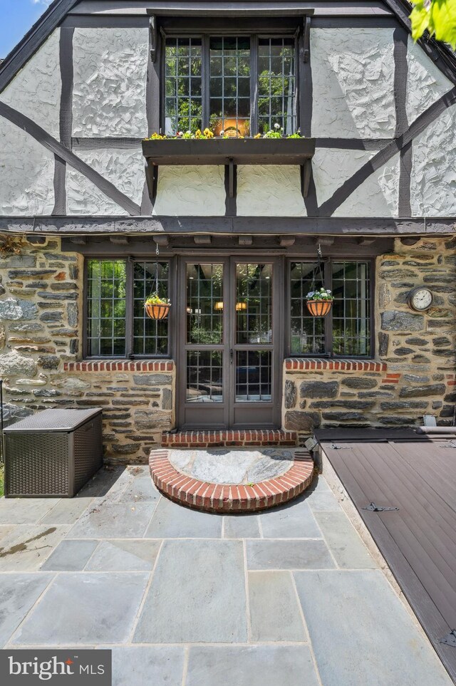 410 Arthurs Round Table, Wynnewood, PA 19096 - view of exterior entry with french doors and stone siding
