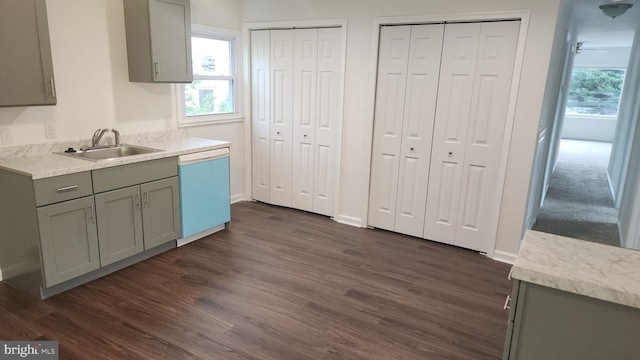 313 Park St, Waynesboro, PA 17268 - kitchen featuring dishwasher, gray cabinets, a sink, and dark wood finished floors