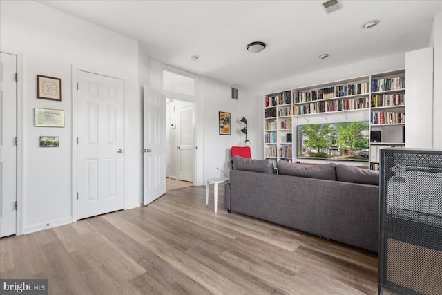 living area with wood finished floors