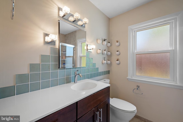 355 Agabiti Ct, Hamilton, NJ 08610 - full bath with toilet, decorative backsplash, a shower with shower door, vanity, and baseboards