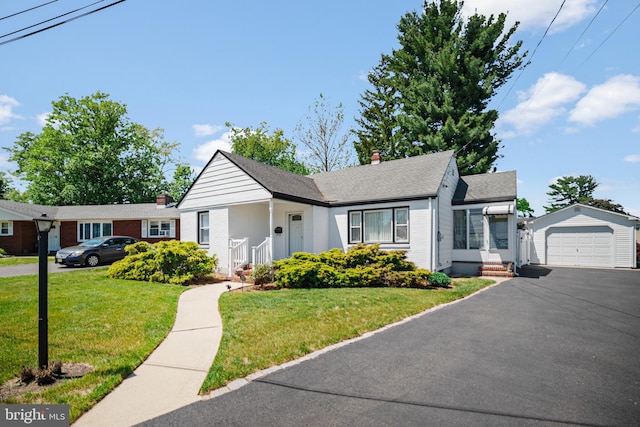 355 Agabiti Ct, Hamilton, NJ 08610 - view of front of home with an outbuilding, a chimney, driveway, and a front lawn