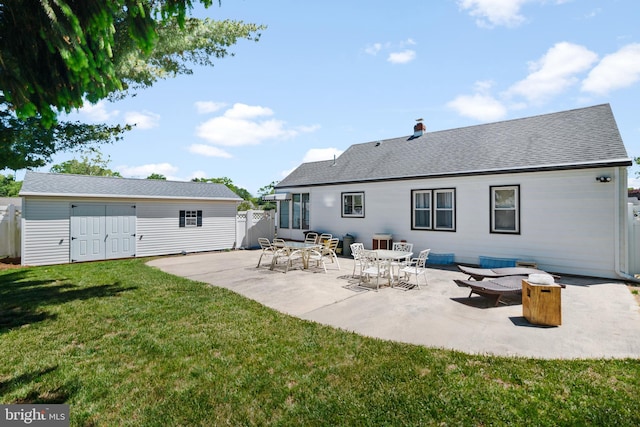 355 Agabiti Ct, Hamilton, NJ 08610 - back of property featuring an outbuilding, a patio, and a shingled roof