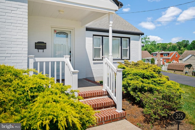 355 Agabiti Ct, Hamilton, NJ 08610 - property entrance featuring brick siding and roof with shingles