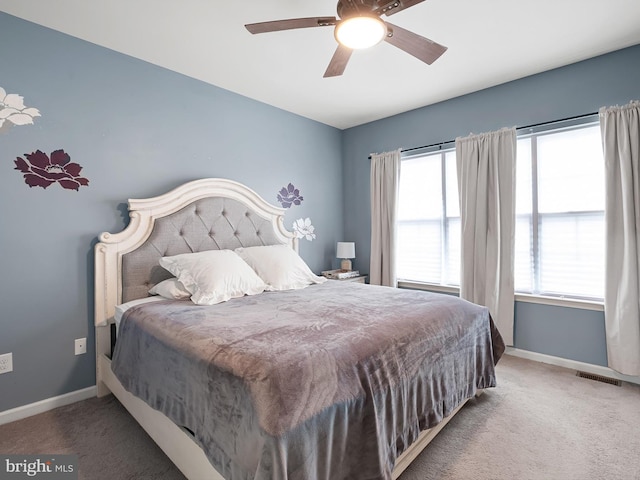 1390 Parish Ave, Claymont, DE 19703 - carpeted bedroom featuring baseboards and a ceiling fan