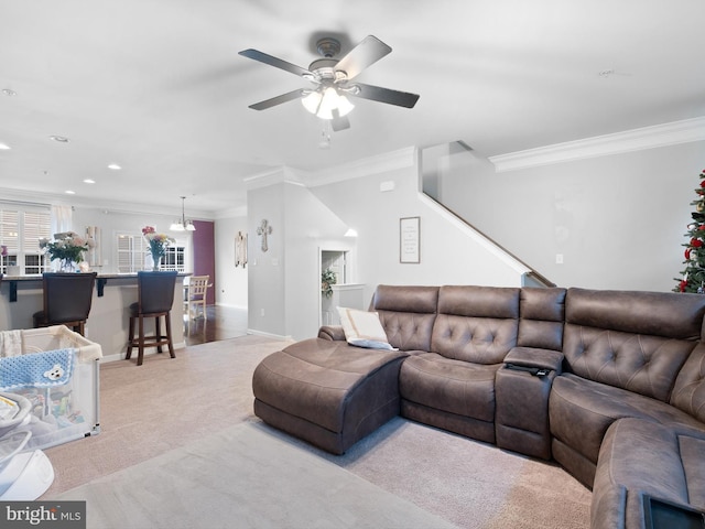 1390 Parish Ave, Claymont, DE 19703 - living area featuring ornamental molding, light colored carpet, a ceiling fan, and recessed lighting
