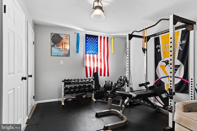 workout area with baseboards
