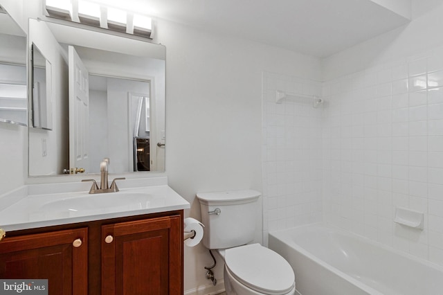 bathroom with toilet, vanity, and washtub / shower combination