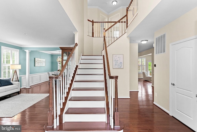 43127 Rocks Way, Leesburg, VA 20176 - stairs with crown molding, wood finished floors, and wainscoting