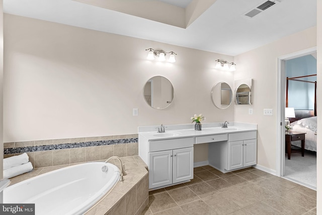 43127 Rocks Way, Leesburg, VA 20176 - bathroom with ensuite bath, double vanity, a garden tub, and tile patterned flooring
