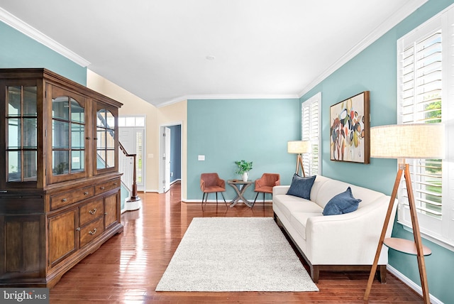 43127 Rocks Way, Leesburg, VA 20176 - living area with wood finished floors, ornamental molding, baseboards, stairs, and vaulted ceiling